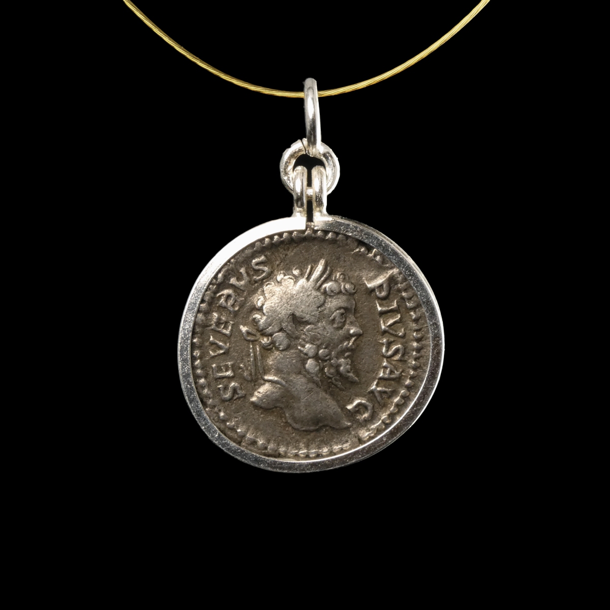 Silver pendant with Roman coin of Septimus Severus - Dea Caelestis riding on lion