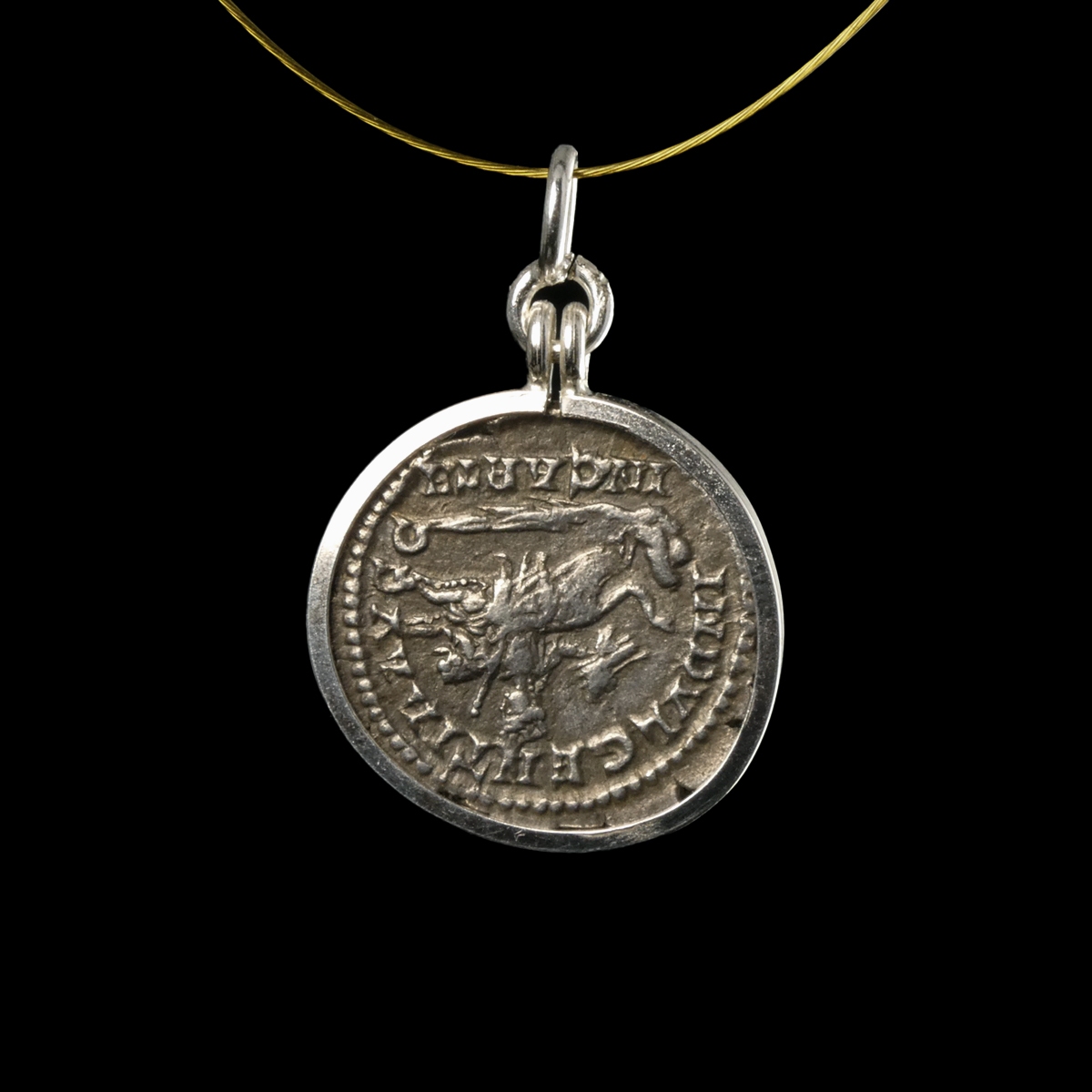 Silver pendant with Roman coin of Septimus Severus - Dea Caelestis riding on lion