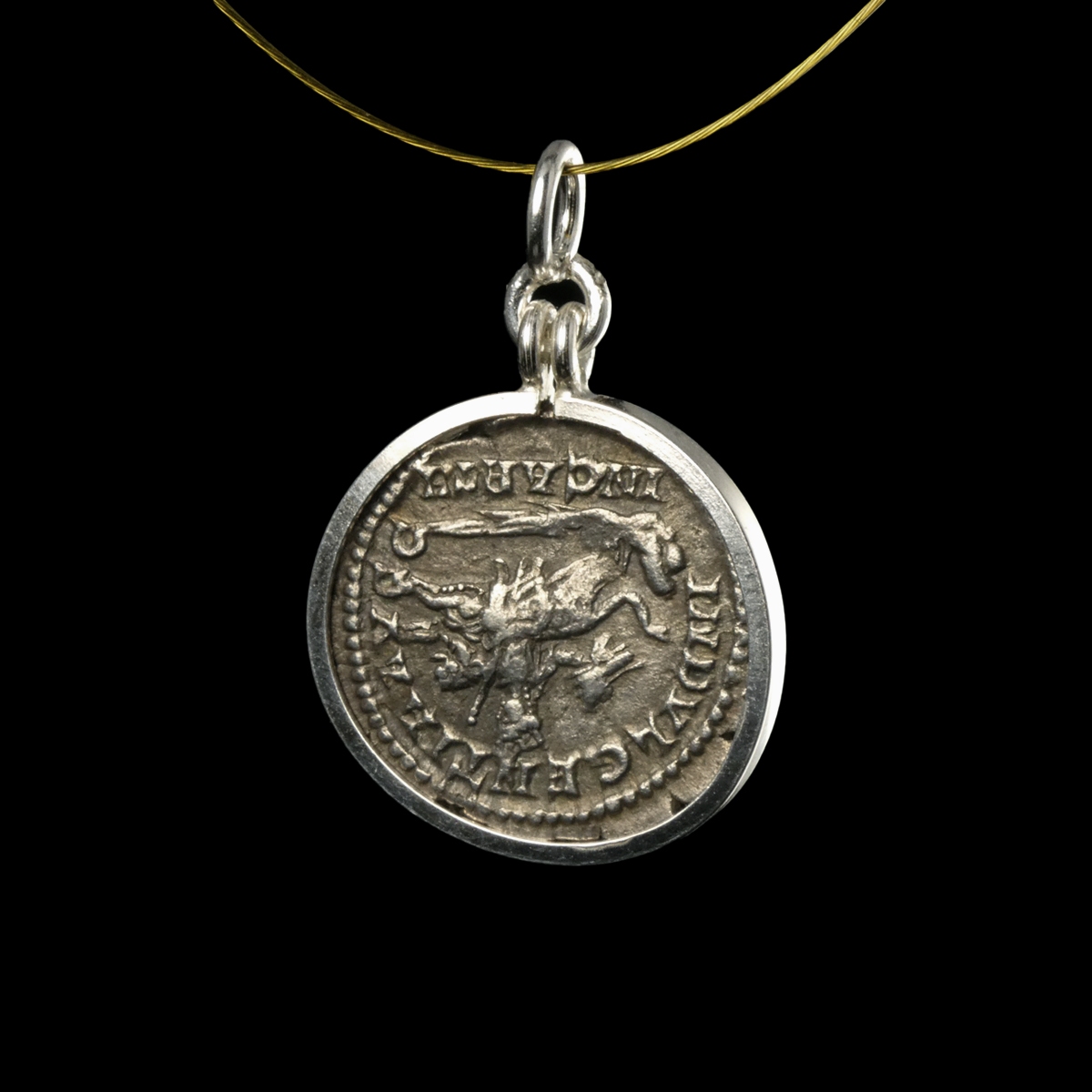 Silver pendant with Roman coin of Septimus Severus - Dea Caelestis riding on lion