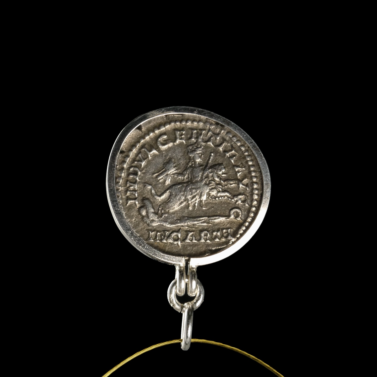 Silver pendant with Roman coin of Septimus Severus - Dea Caelestis riding on lion