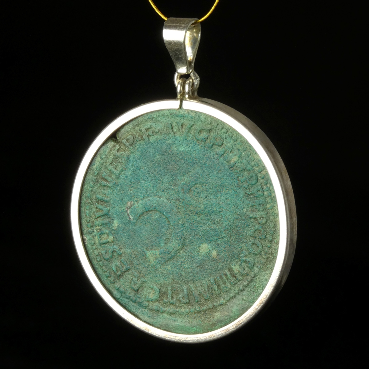 Silver pendant with Roman coin of Vespasian