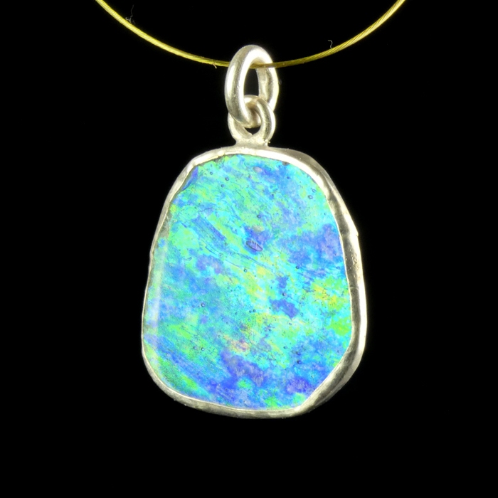 Silver pendant with Roman iridescent glass