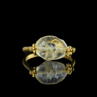 Ring with a Roman semi-translucent glass bead