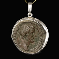 Silver pendant with Roman coin of Antoninus Pius