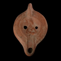 Ancient Roman terracotta oil lamp with warrior