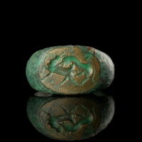 Ancient Roman bronze seal ring, Lion attacking a deer