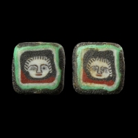 Romano-Egyptian mosaic glass face bead
