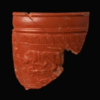 Ancient Roman terra sigillata fragment showing Gladiatoral scene, Venatio combat