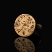 Medieval silver seal ring with Falcon and text