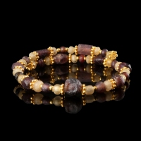Bracelet with Roman purple and semi-translucent glass beads in a flexible design