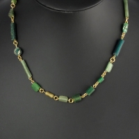Necklace with Roman green glass beads in a linked design