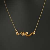 Necklace with wire-wrapped Roman amber glass beads and spiral details