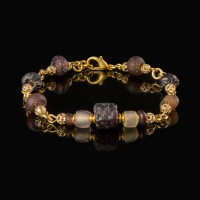 Bracelet with Roman purple and semi-translucent glass beads in a linked design