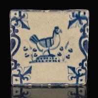 Dutch Delft blue and white tile with Hen