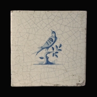 Dutch Delft blue and white tile with Bird on a branch