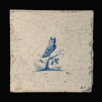 Dutch Delft blue and white tile with an Owl on a branch