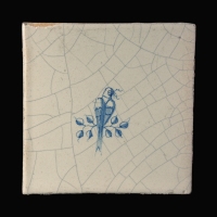 Dutch Delft blue and white tile with Bird on a branch