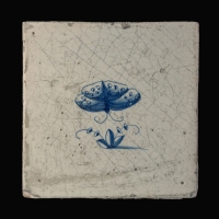 Dutch Delft blue and white tile with a butterfly