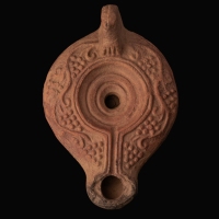 Ancient Roman Terracotta Oil Lamp with Grapevines